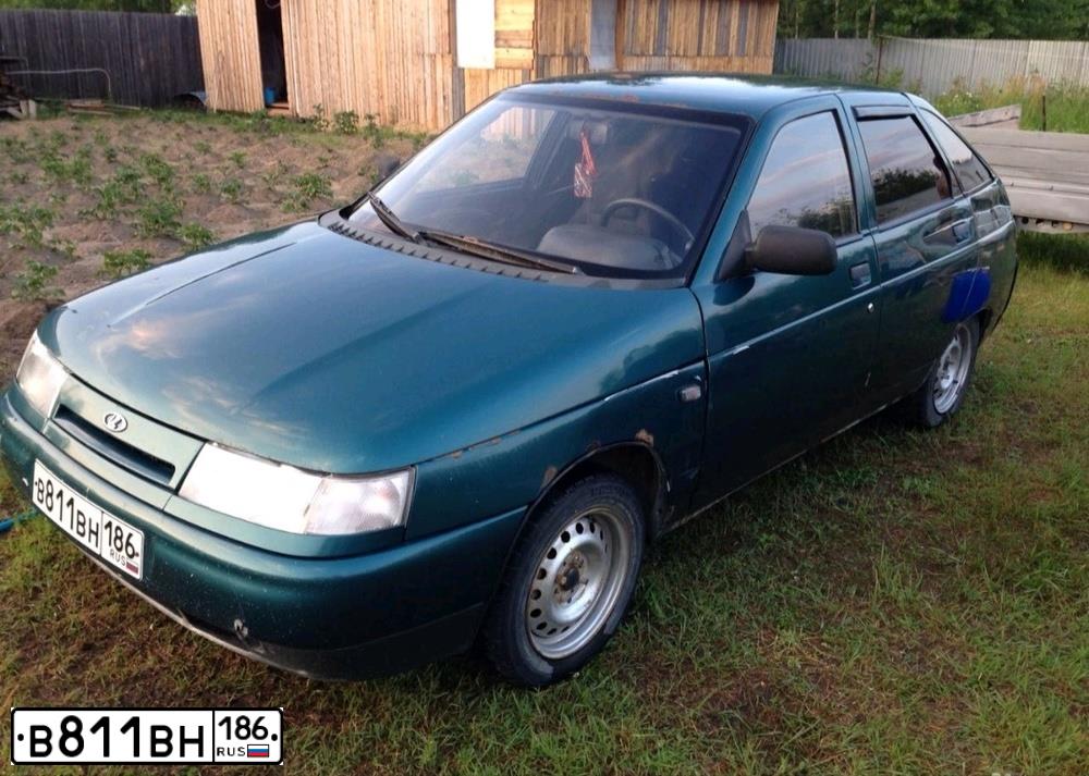 Фото автомобиля LADA 2112, 2001 — госномер Е638ОТ186. Цвет: СЕРЕБРИСТО ЗЕЛЕНЫЙ
