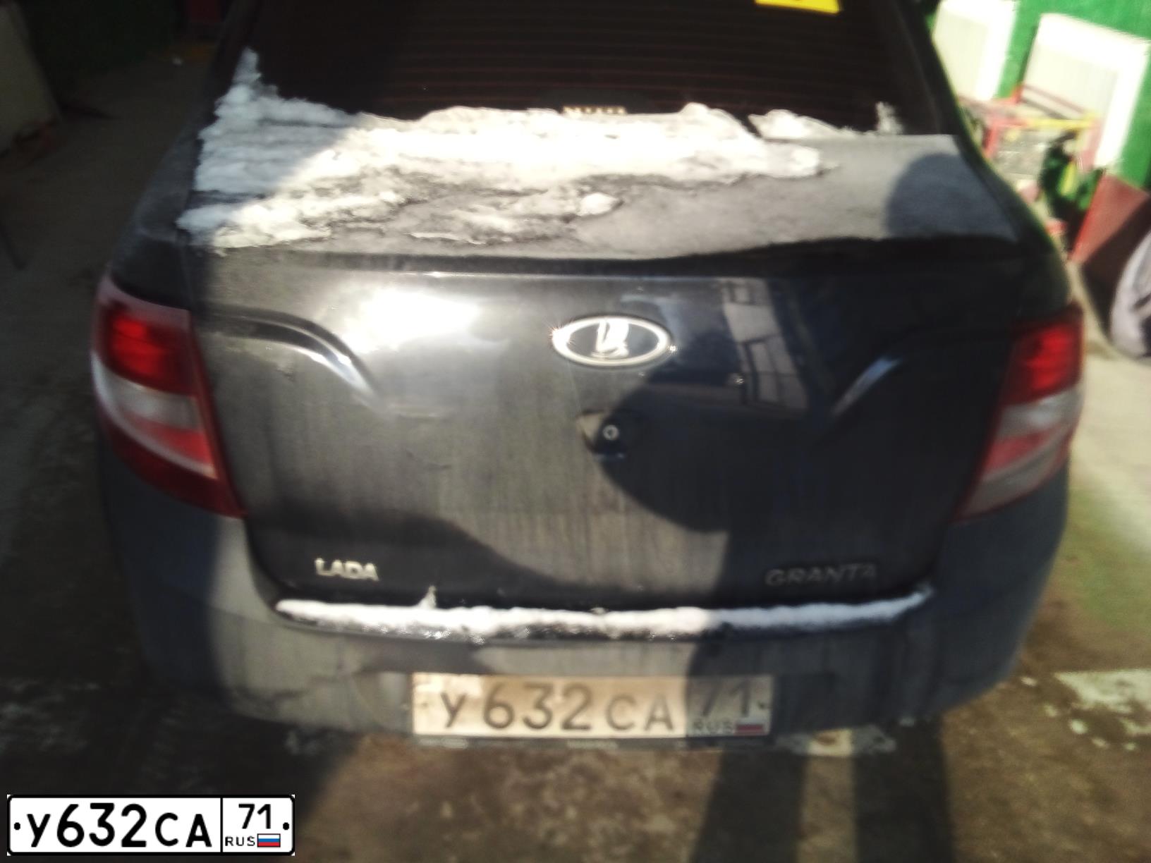 Фото автомобиля LADA 2190 GRANTA, 2012 — госномер Х034УР36. Цвет: Сине-Черный