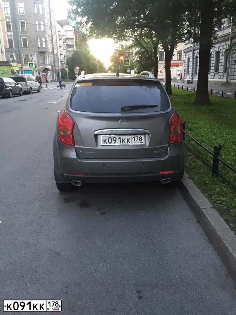 Фото автомобиля SSANGYONG ACTYON, 2012 — госномер К091КК178. Цвет: ТЕМНО-СЕРЫЙ