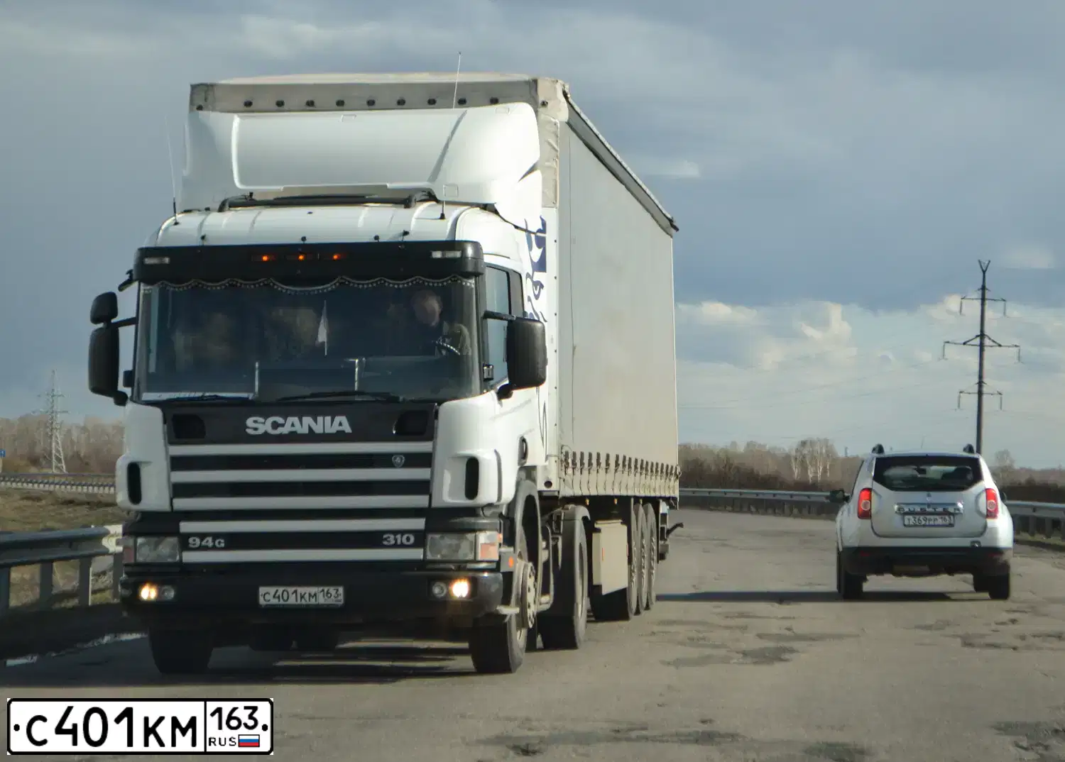 Фото автомобиля SCANIA SERIE P /4X2/, 2003 — госномер С401КМ163. Цвет: БЕЛЫЙ