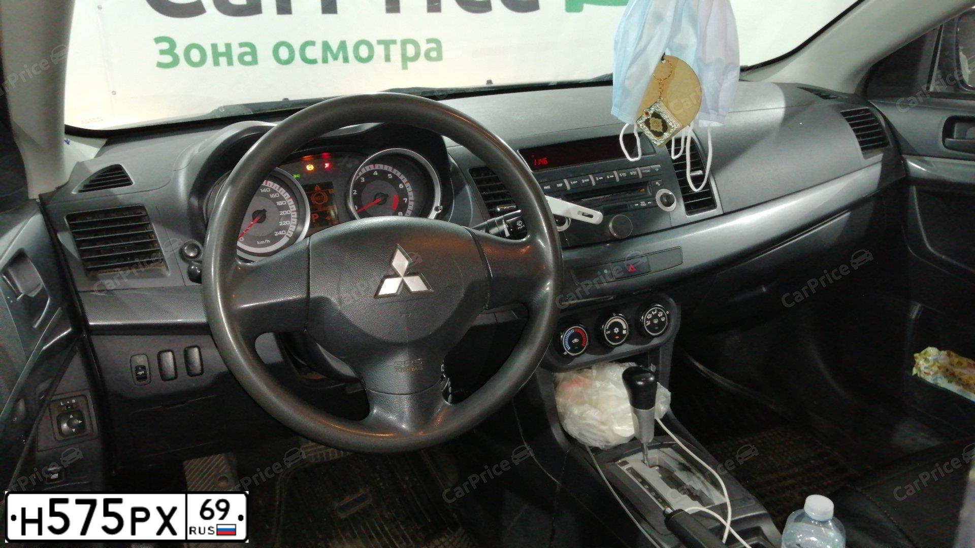 Фото автомобиля MITSUBISHI LANCER, 2008 — госномер С068ТК790. Цвет: ЧЕРНЫЙ