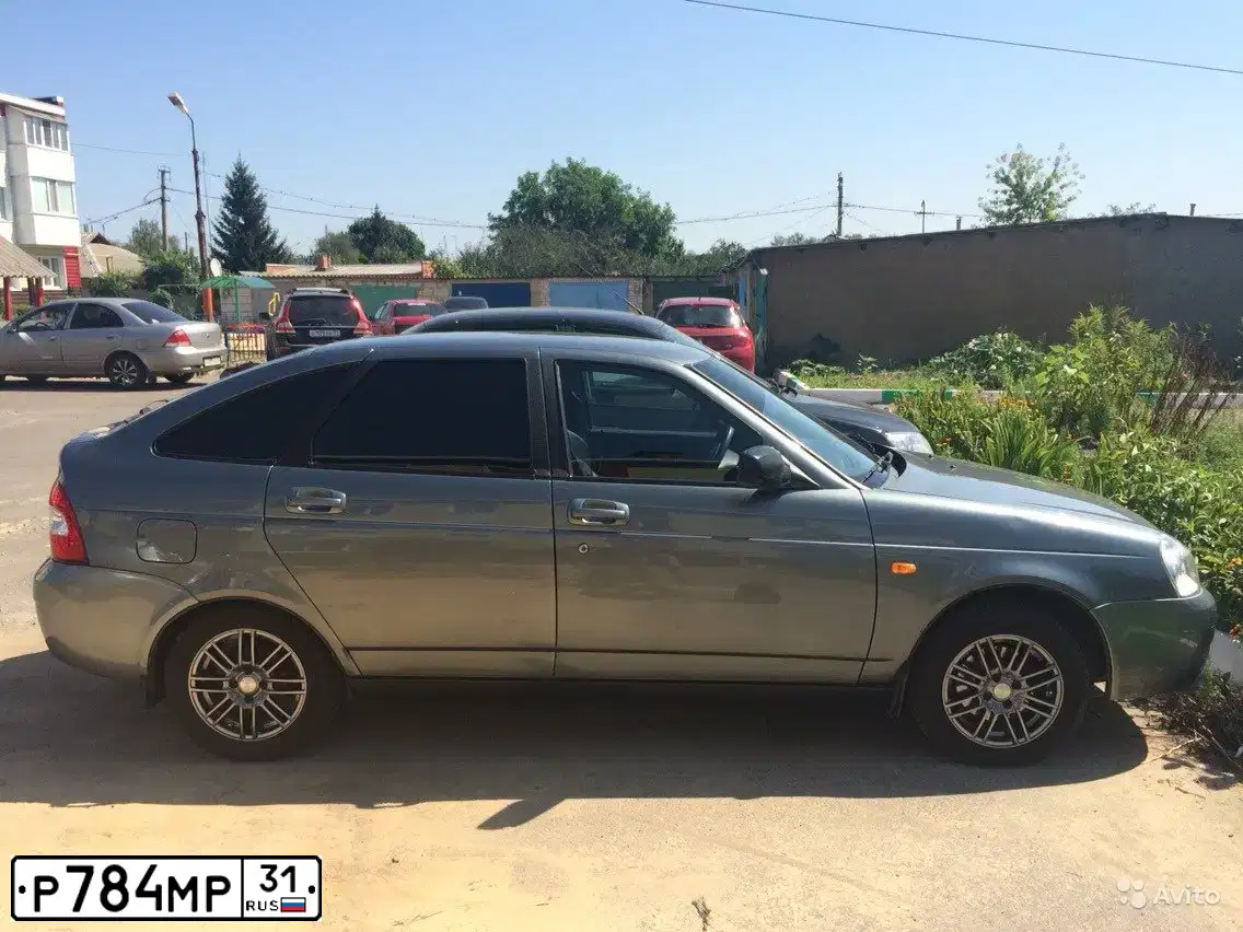 Фото автомобиля LADA PRIORA, 2011 — госномер Х400МС136. Цвет: средний серо-зеленый металлик