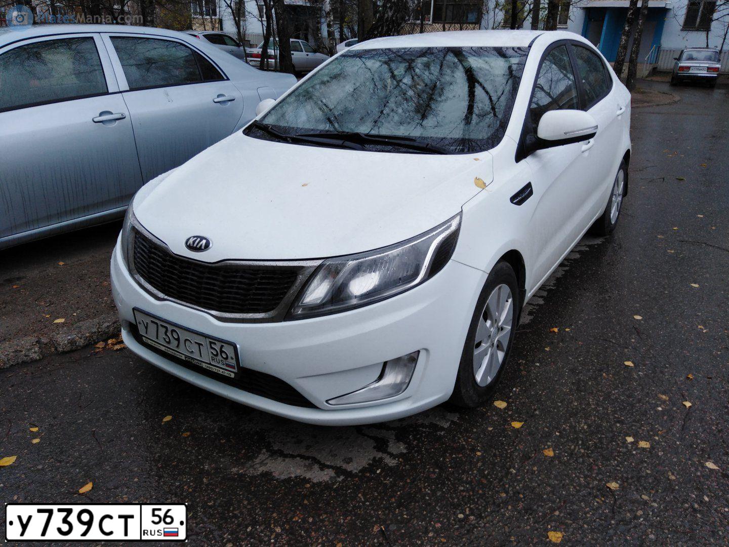 Фото автомобиля KIA RIO, 2014 — госномер У739СТ56. Цвет: БЕЛЫЙ
