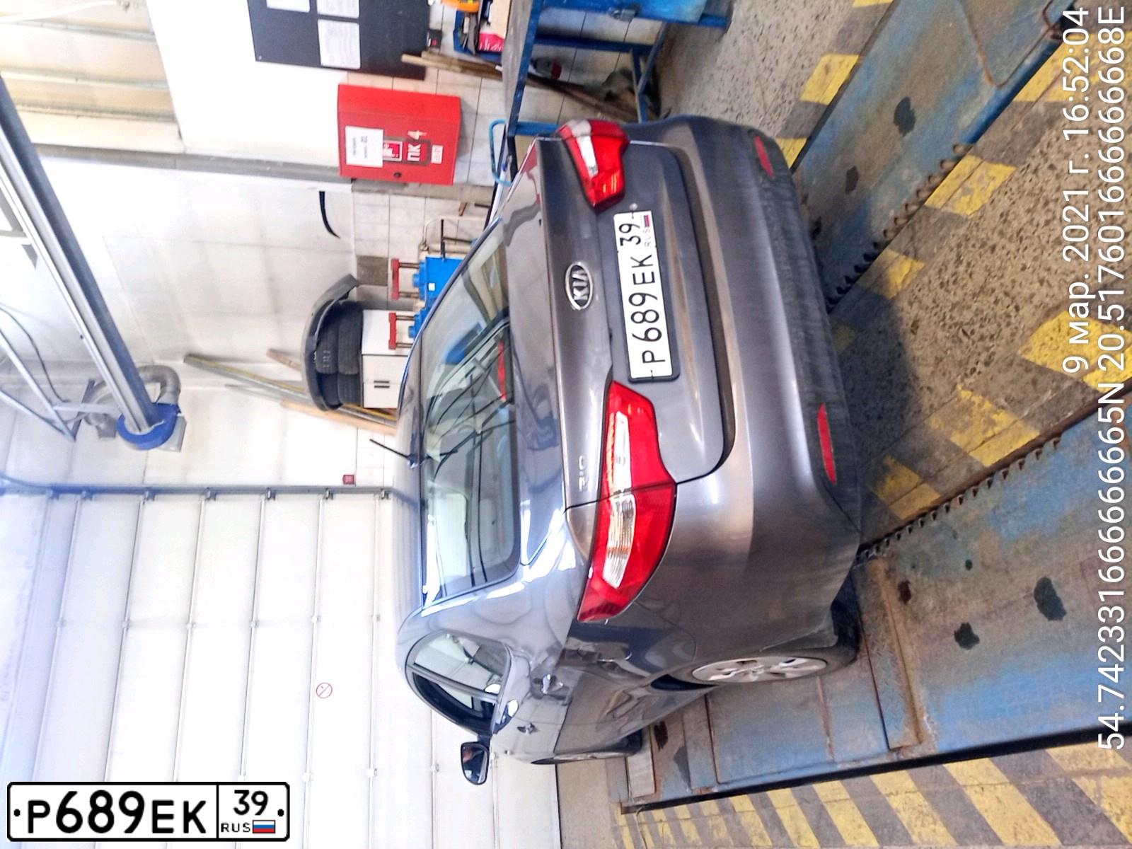 Фото автомобиля KIA RIO, 2012 — госномер Р689ЕК39. Цвет: СЕРЫЙ