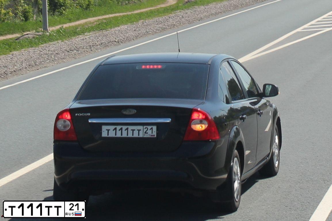 Фото автомобиля FORD FOCUS, 2009 — госномер Т111ТТ21. Цвет: ЧЕРНЫЙ