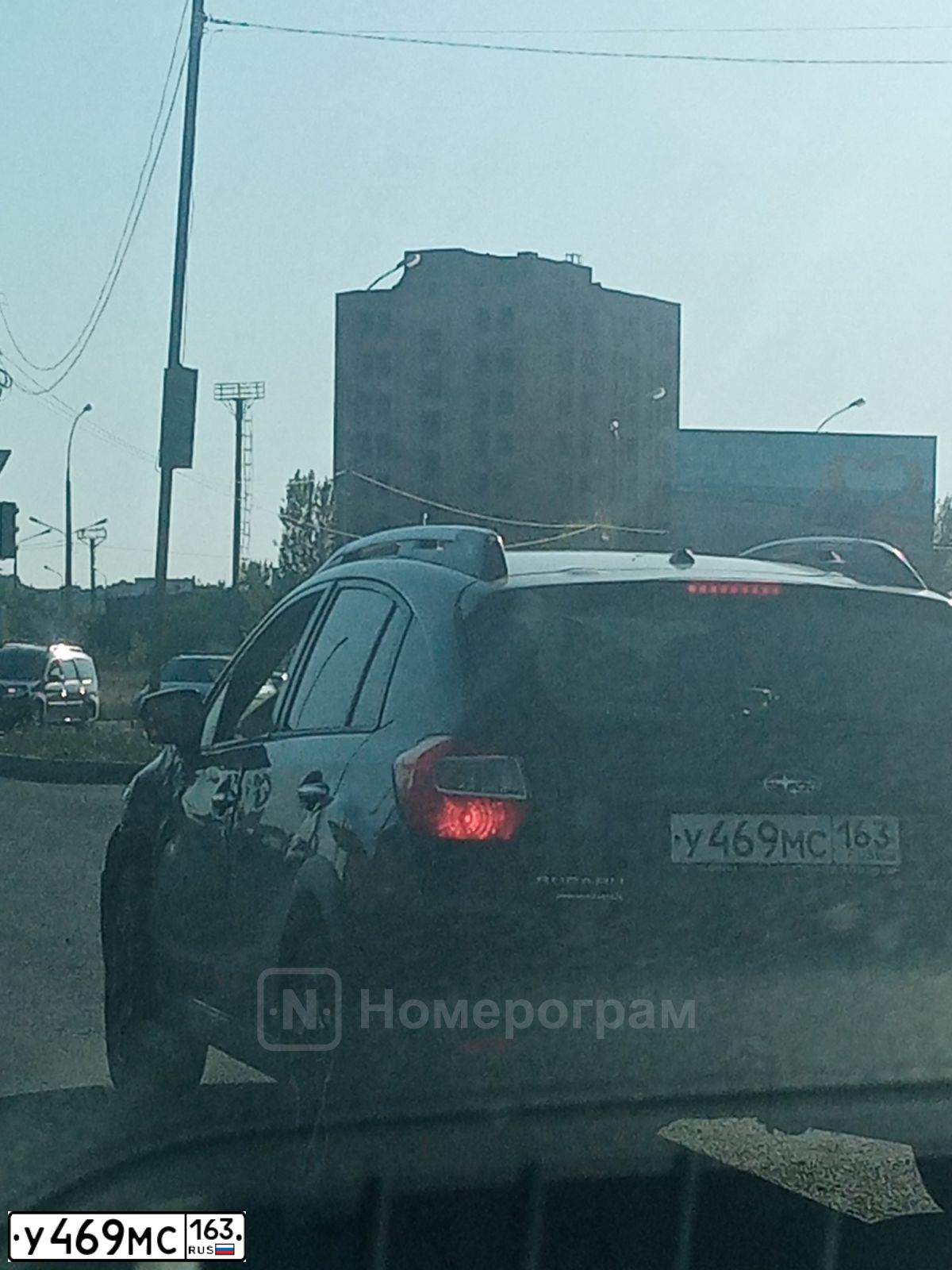 Фото автомобиля SUBARU IMPREZA, 2014 — госномер У469МС163. Цвет: ТЕМНО-СЕРЫЙ