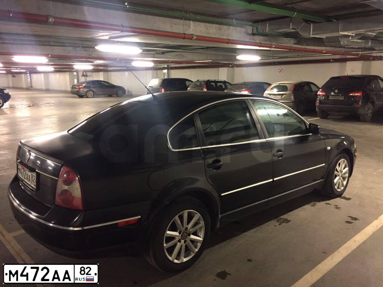 Фото автомобиля VOLKSWAGEN PASSAT, 2001 — госномер Е704НУ147. Цвет: ЧЕРНЫЙ