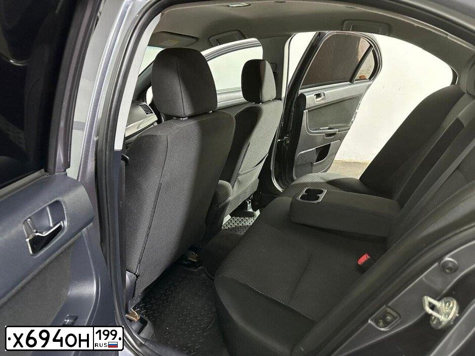 Фото автомобиля MITSUBISHI LANCER, 2008 — госномер М153НЕ797. Цвет: СЕРЫЙ
