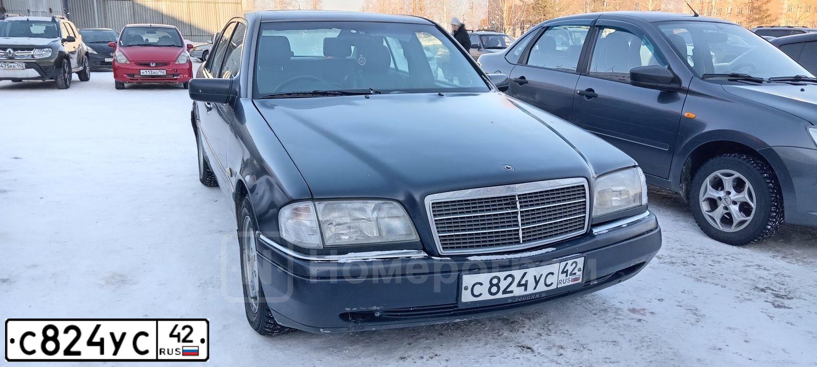 Фото автомобиля MERCEDES C-KLASSE, 1995 — госномер С824УС42. Цвет: ТЕМНО СИНИЙ