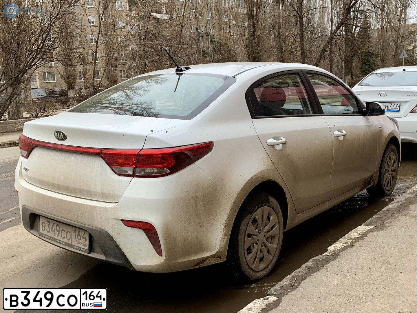 Фото автомобиля KIA RIO, 2019 — госномер В349СО164. Цвет: Белый