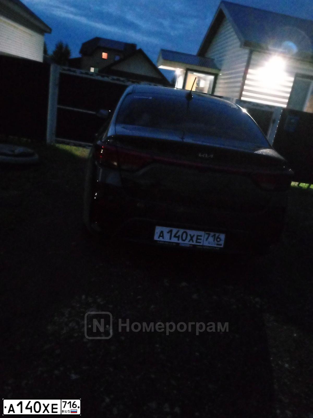 Фото автомобиля KIA RIO, 2018 — госномер А140ХЕ716. Цвет: ЧЕРНЫЙ