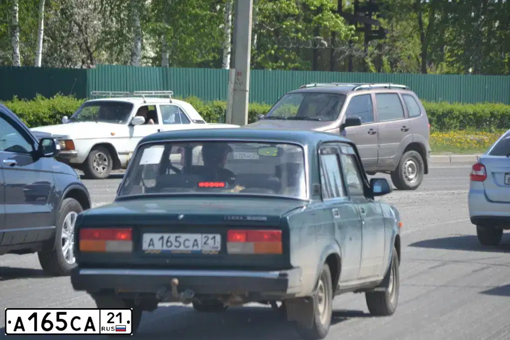 Фото автомобиля LADA 2107, 2007 — госномер А165СА21. Цвет: Темно-зеленый