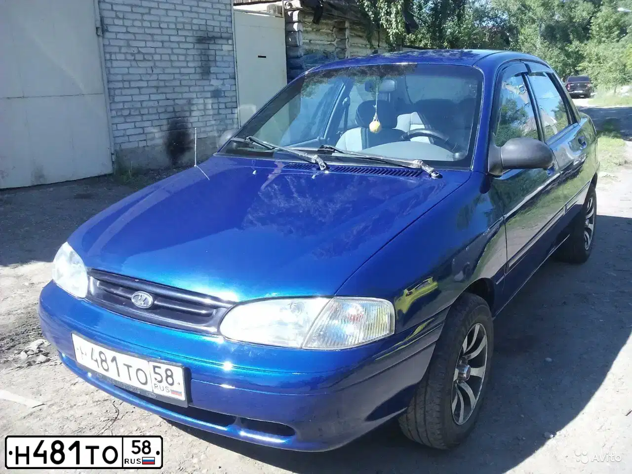Фото автомобиля KIA AVELLA, 1998 — госномер К718ВН199. Цвет: СИНИЙ