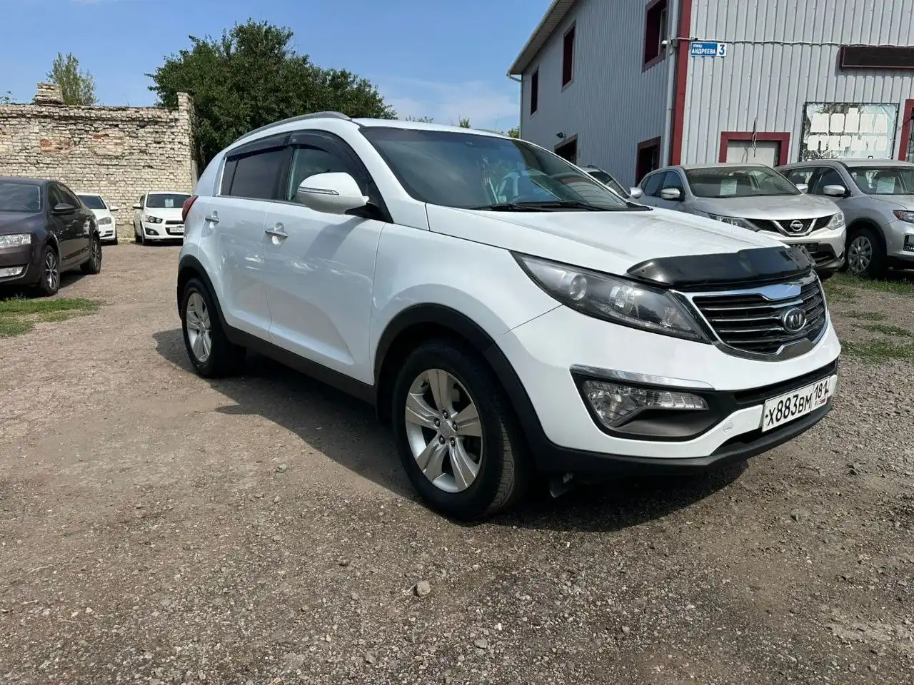 Фото автомобиля KIA SPORTAGE, 2011 — госномер Х883ВМ181. Цвет: Белый