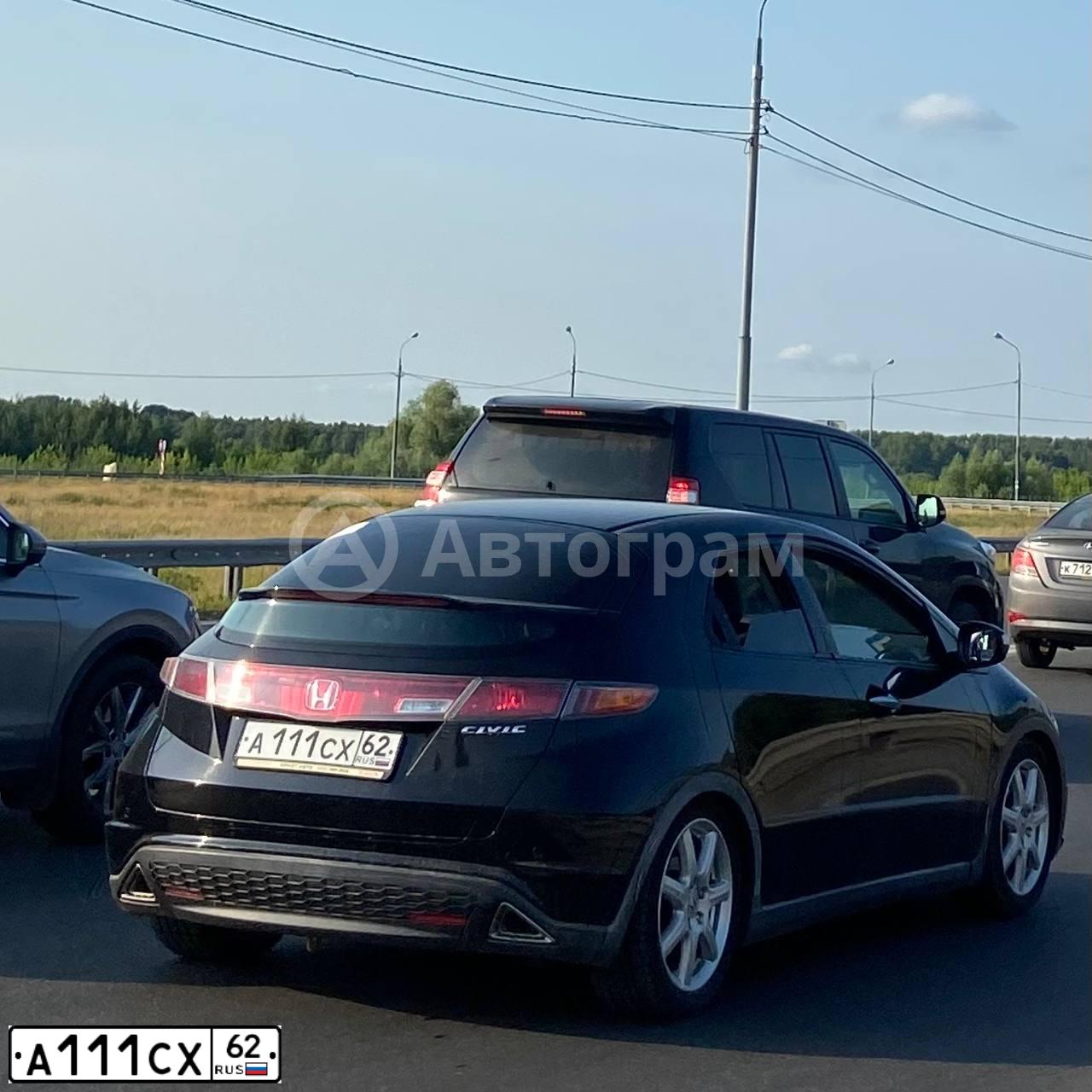 Фото автомобиля TOYOTA AURIS, 2007 — госномер А111СХ62. Цвет: СЕРЫЙ