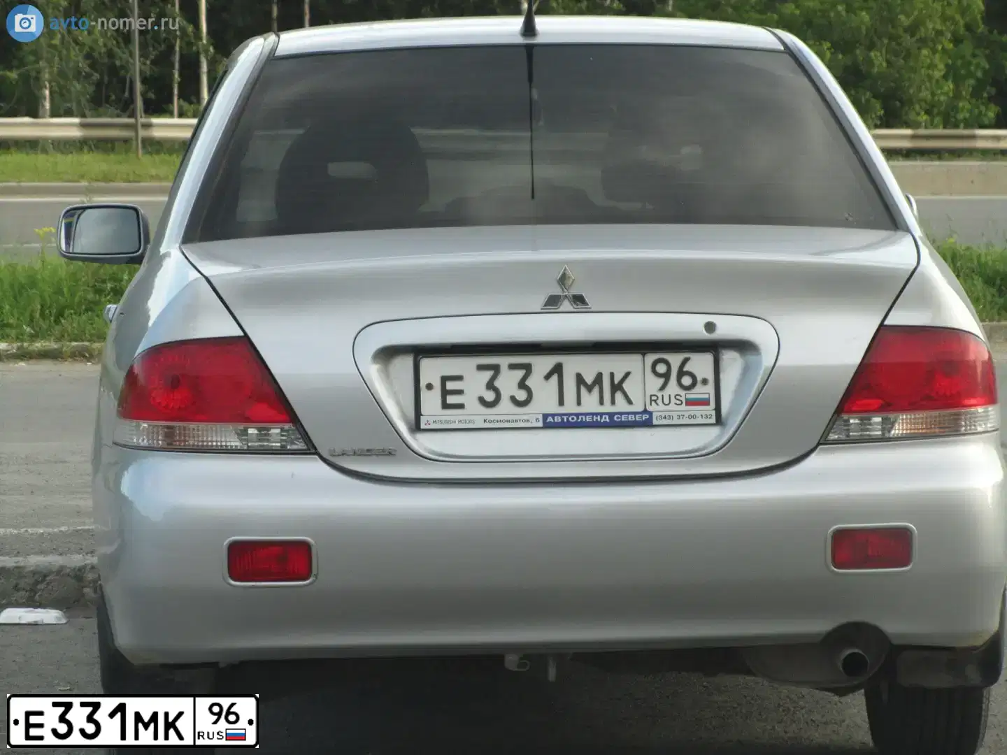 Фото автомобиля MITSUBISHI LANCER, 2006 — госномер Н147ТС196. Цвет: СВЕТЛО-СЕРЫЙ