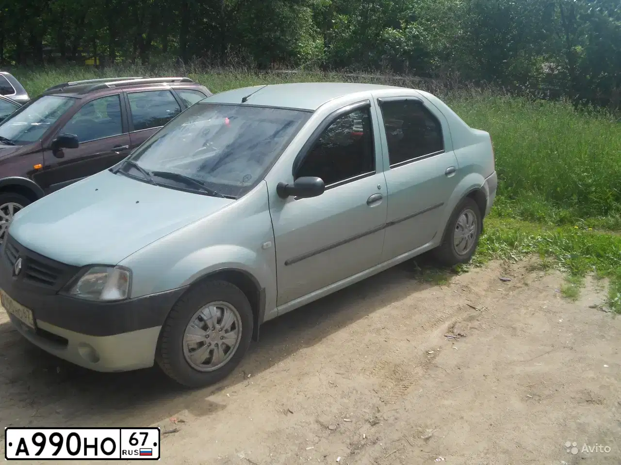 Фото автомобиля RENAULT LOGAN, 2007 — госномер А990НО67. Цвет: СВЕТЛО-ЗЕЛЕНЫЙ