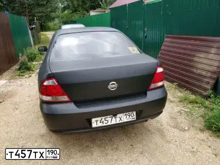 Фото автомобиля NISSAN ALMERA, 2012 — госномер Т457ТХ190. Цвет: ЧЕРНЫЙ