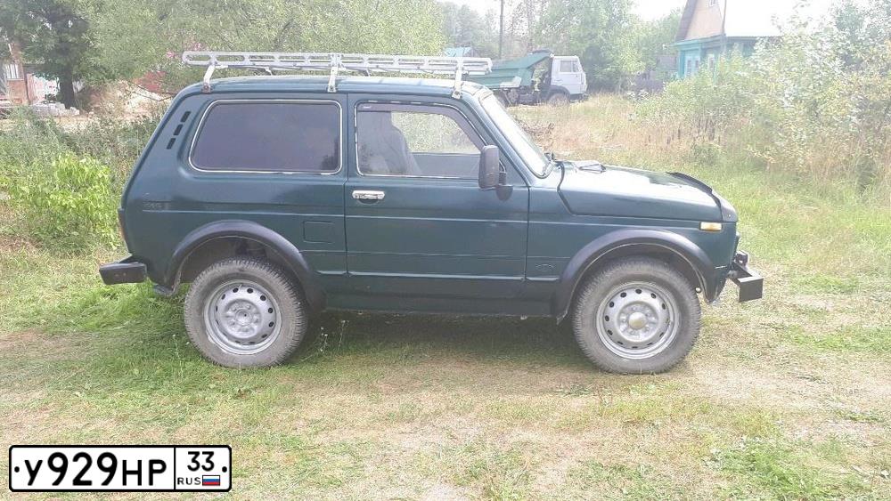 Фото автомобиля LADA 2121 NIVA, 2000 — госномер Е813ТК33. Цвет: ЗЕЛЕНЫЙ