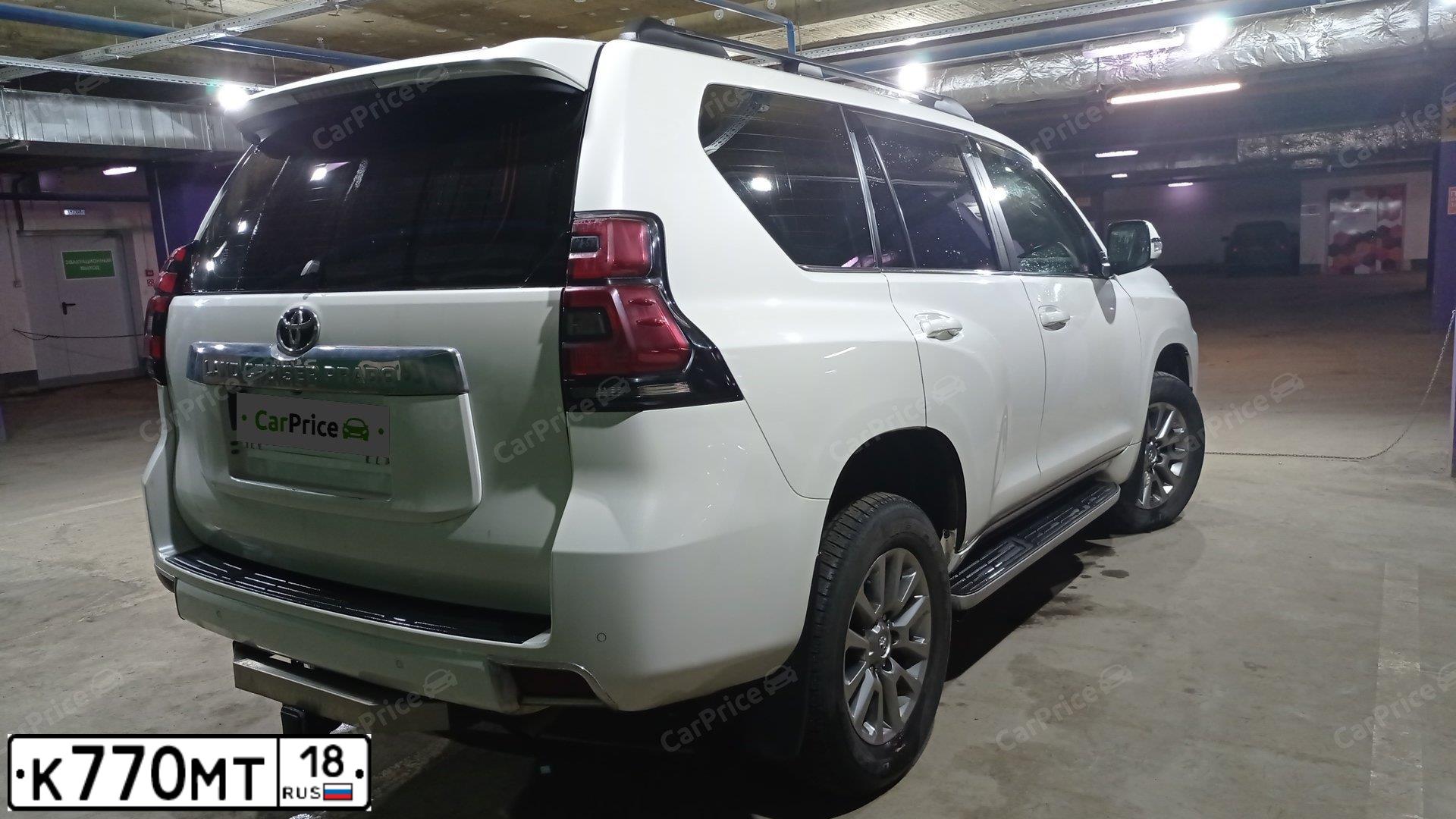 Фото автомобиля TOYOTA LANDCRUISER, 2018 — госномер К770МТ18. Цвет: Белый