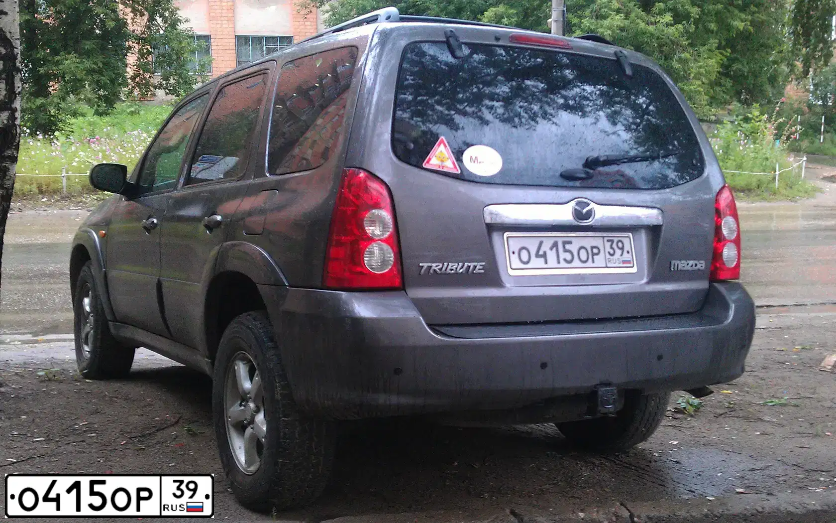 Фото автомобиля MAZDA TRIBUTE, 2005 — госномер О415ОР39. Цвет: СЕРЫЙ