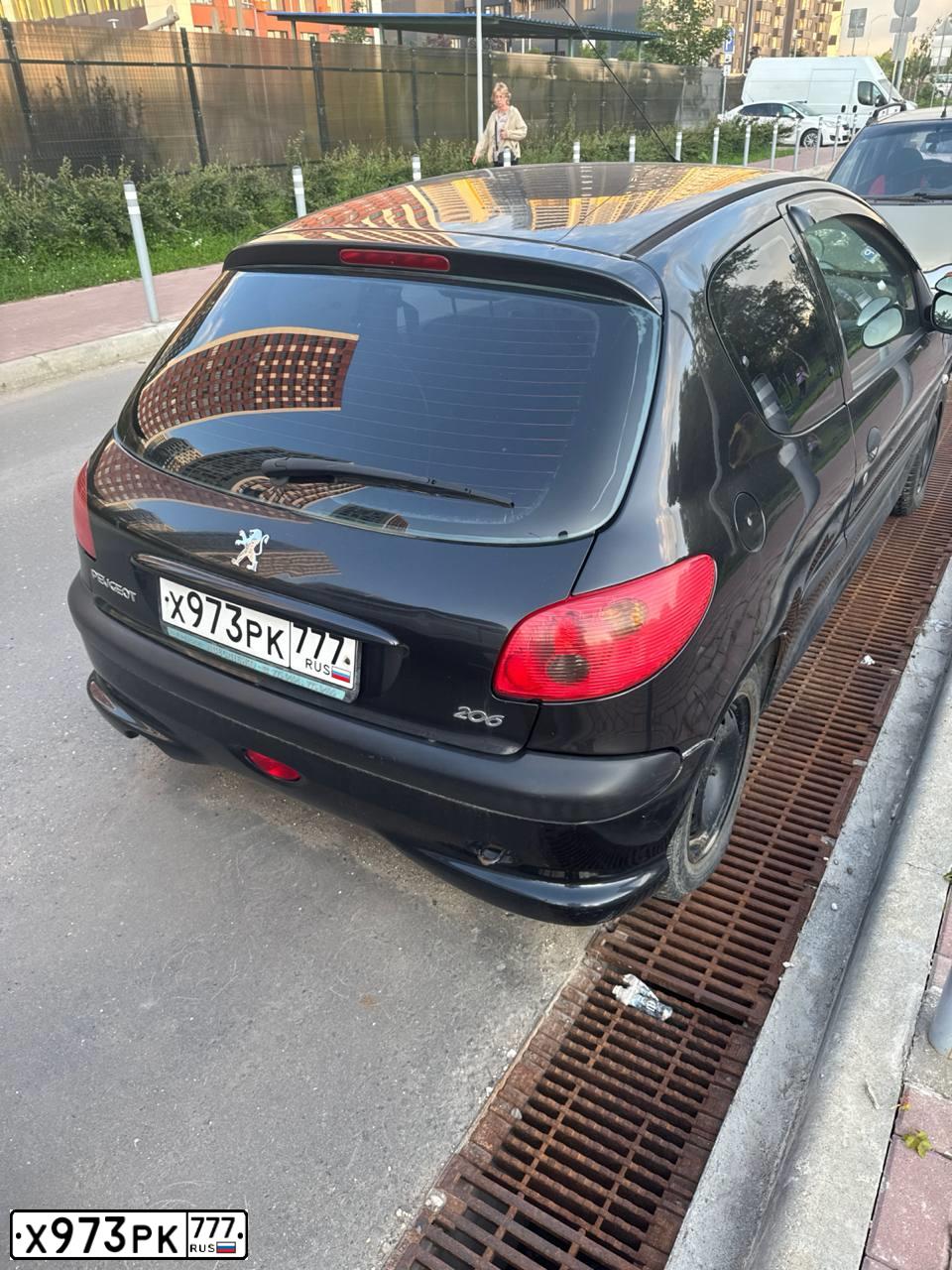 Фото автомобиля PEUGEOT 206, 2006 — госномер В719УО177. Цвет: ЧЕРНЫЙ