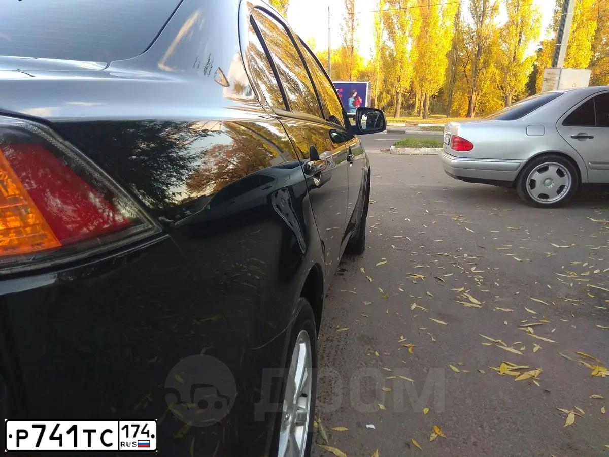 Фото автомобиля MITSUBISHI LANCER, 2014 — госномер Е180ЕТ774