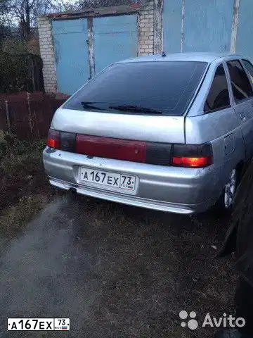 Фото автомобиля LADA 2112, 2002 — госномер А167ЕХ73. Цвет: СВЕТЛО-СЕРЕБРИСТЫЙ МЕТАЛИК