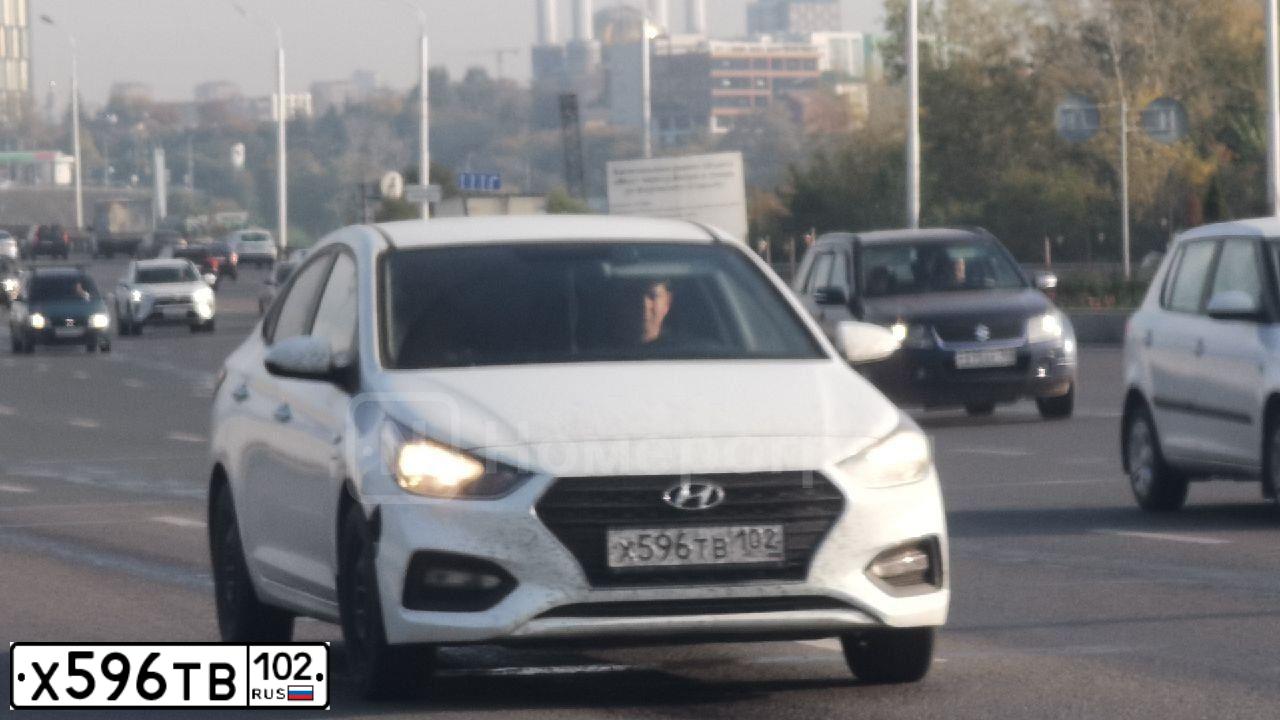 Фото автомобиля HYUNDAI SOLARIS, 2019 — госномер Х596ТВ102. Цвет: Белый