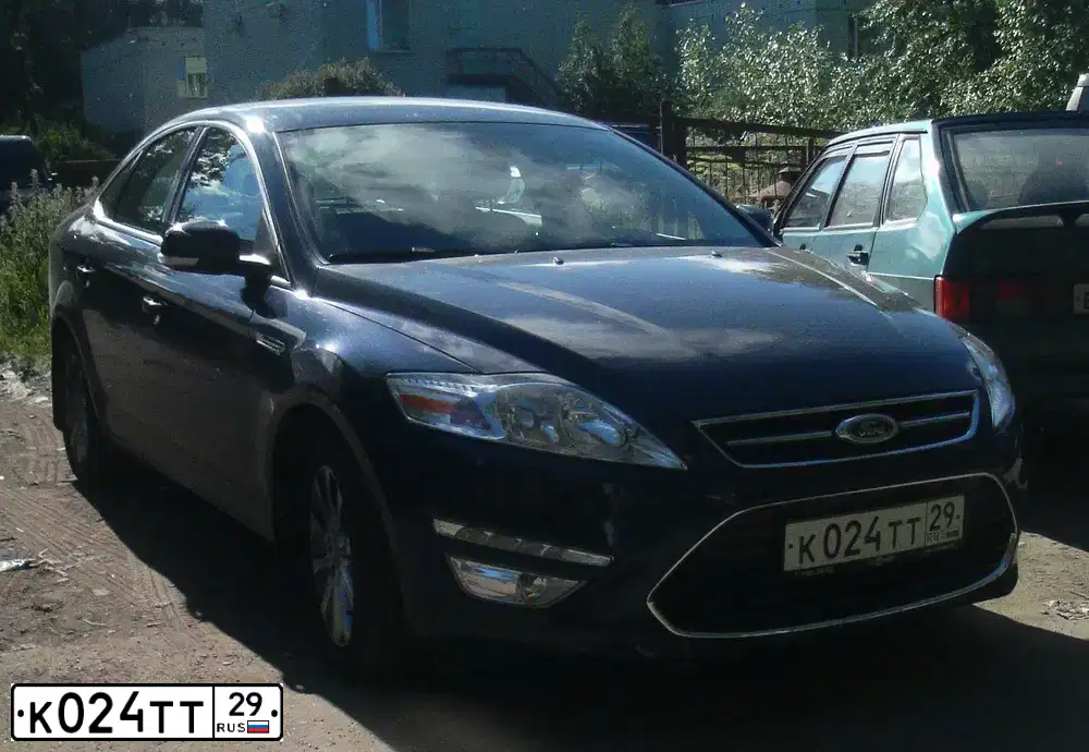 Фото автомобиля FORD MONDEO, 2012 — госномер К024ТТ29. Цвет: Темно-синий