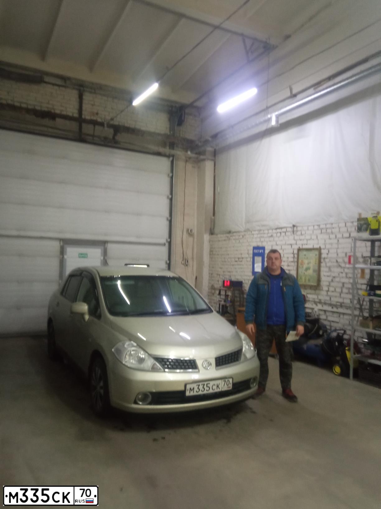 Фото автомобиля NISSAN TIIDA, 2005 — госномер У528НР138