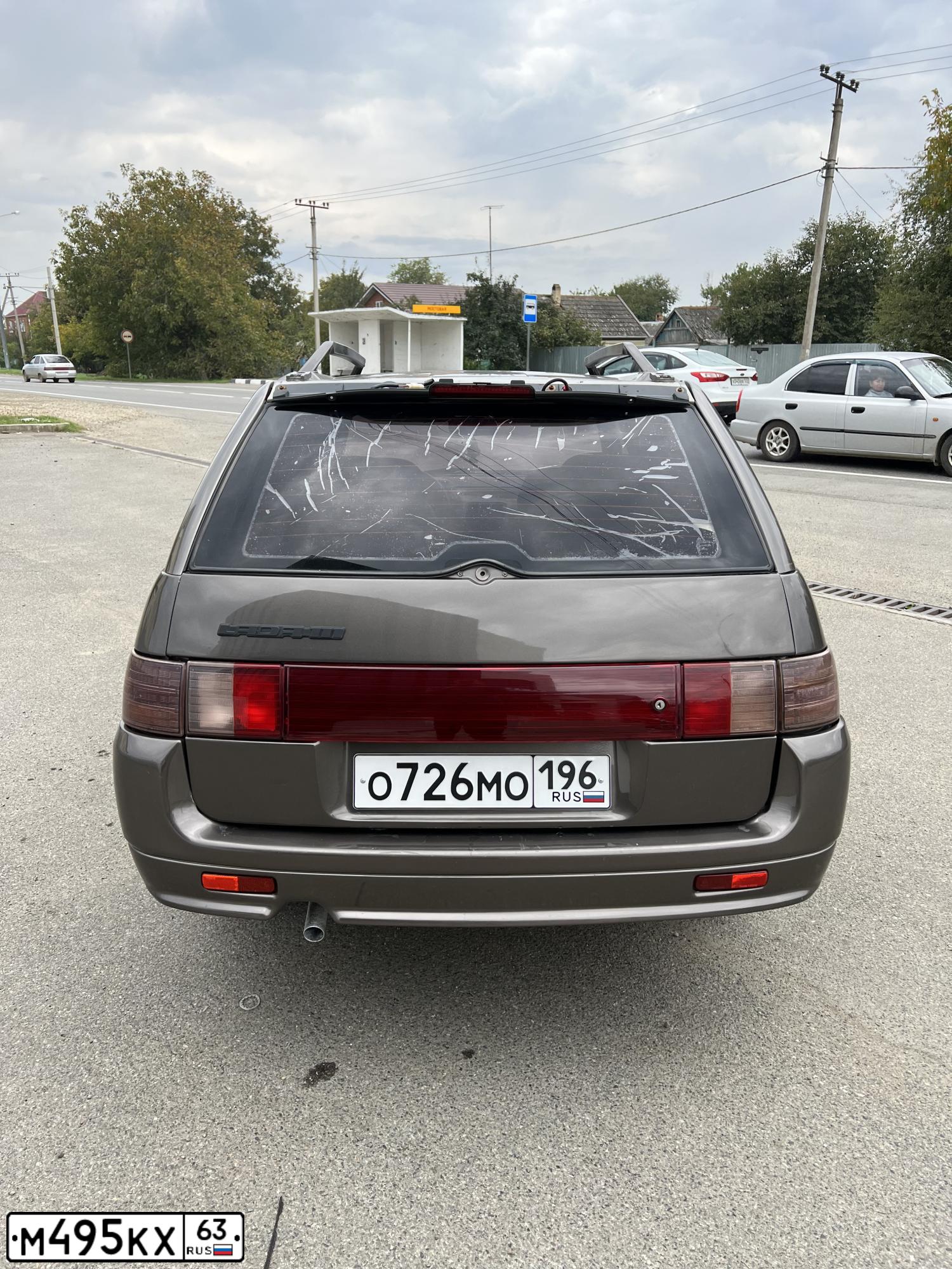 Фото автомобиля LADA 2111, 2000 — госномер М495КХ63. Цвет: СЕРЕБРИСТО-СВЕТЛО-ЗЕЛЕНЫЙ