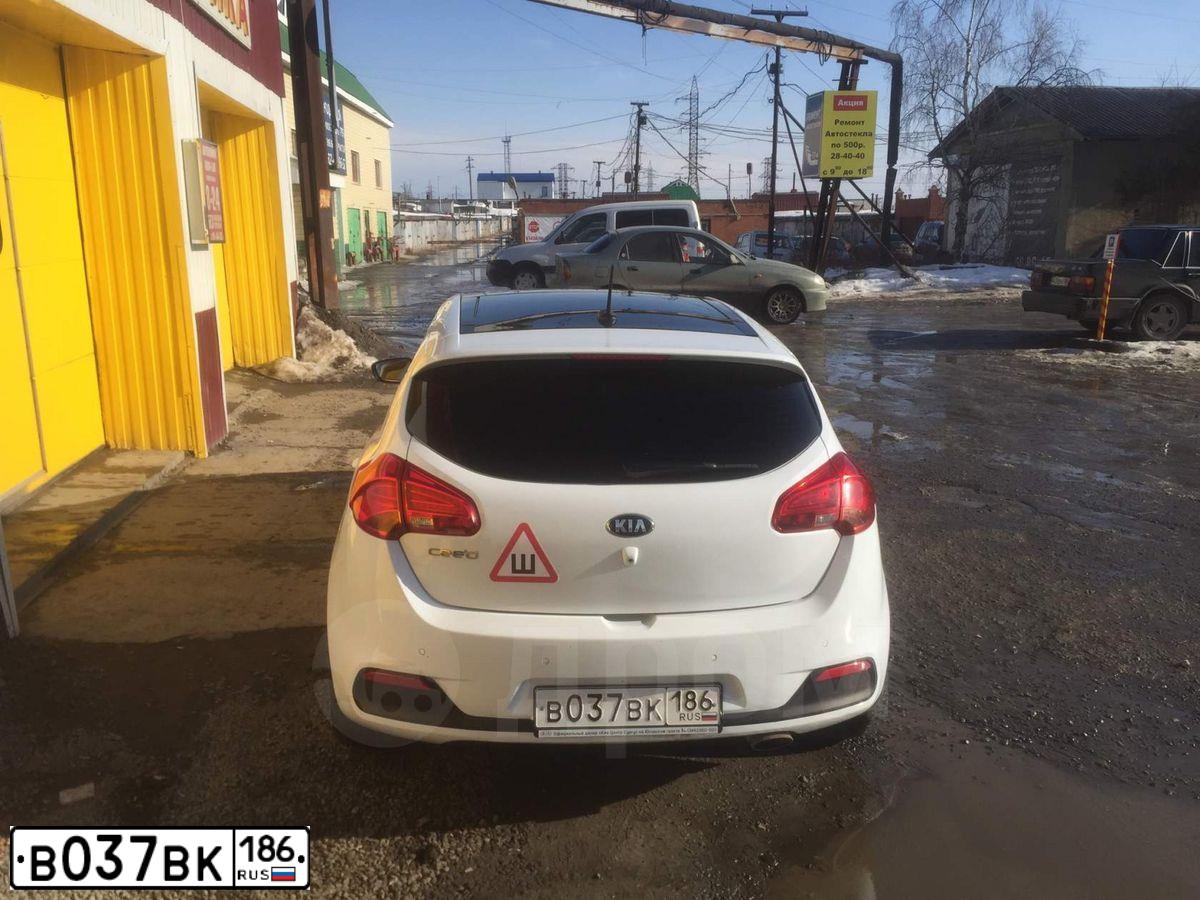 Фото автомобиля KIA CEE'D, 2012 — госномер В037ВК186. Цвет: Серебристый