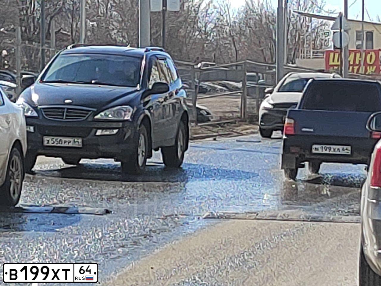 Фото автомобиля LADA 2110 LADA, 2005 — госномер М421АХ64. Цвет: Темно-зеленый