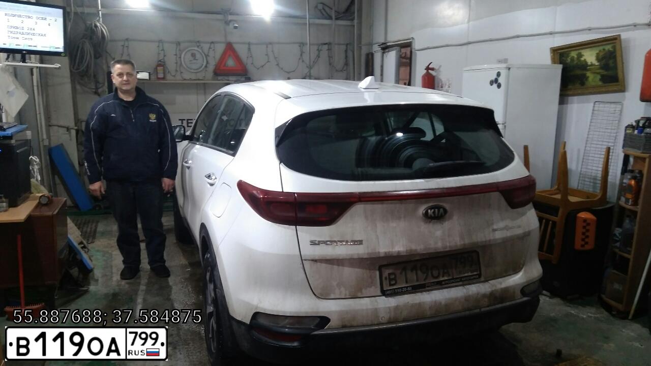 Фото автомобиля KIA SPORTAGE, 2019 — госномер Р937ЕН32. Цвет: Белый