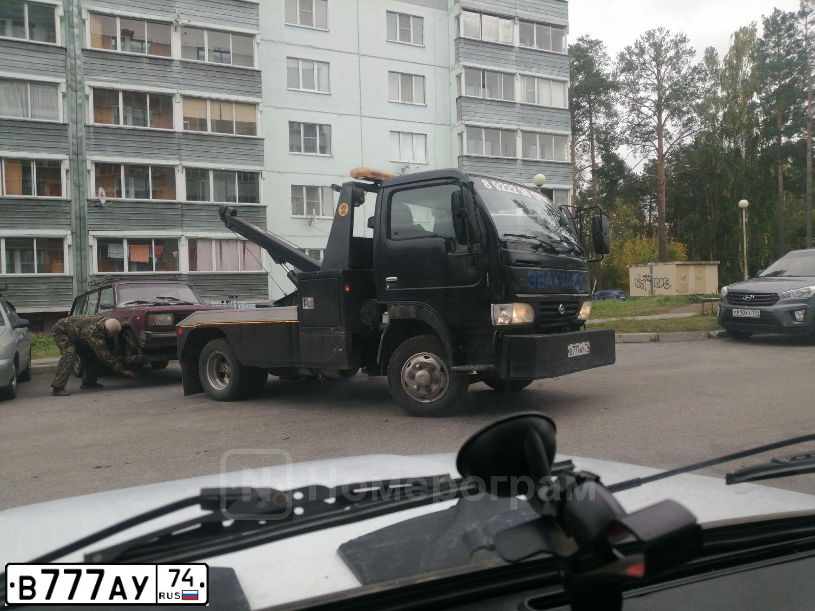 Фото автомобиля ISUZU NQR, 2007 — госномер Е843ЕН702. Цвет: Белый