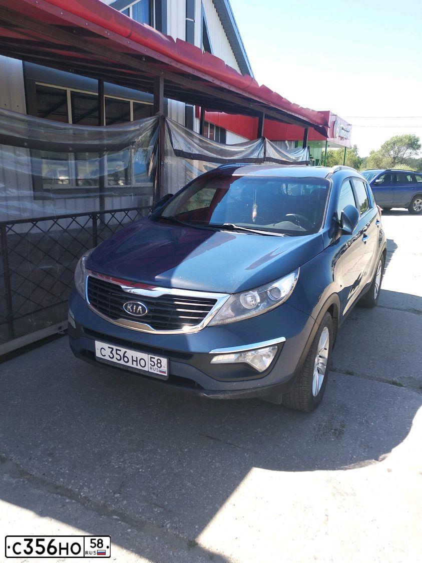 Фото автомобиля KIA SPORTAGE, 2011 — госномер О989ВС32. Цвет: синий