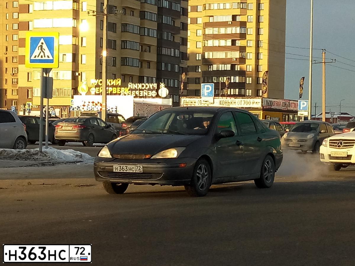 Фото автомобиля FORD FOCUS, 2002 — госномер К100ЕС72. Цвет: СЕРЫЙ