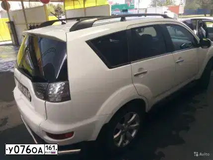 Фото автомобиля MITSUBISHI OUTLANDER, 2011 — госномер В751ВХ716. Цвет: БЕЛЫЙ