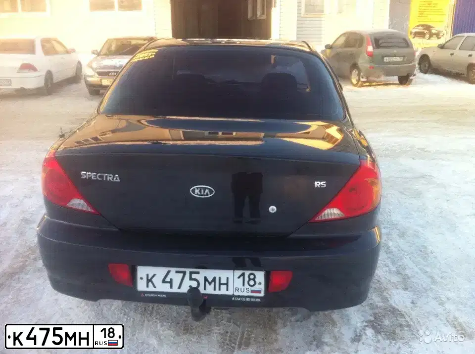 Фото автомобиля KIA SPECTRA, 2008 — госномер Х869ХТ43. Цвет: ЧЕРНЫЙ