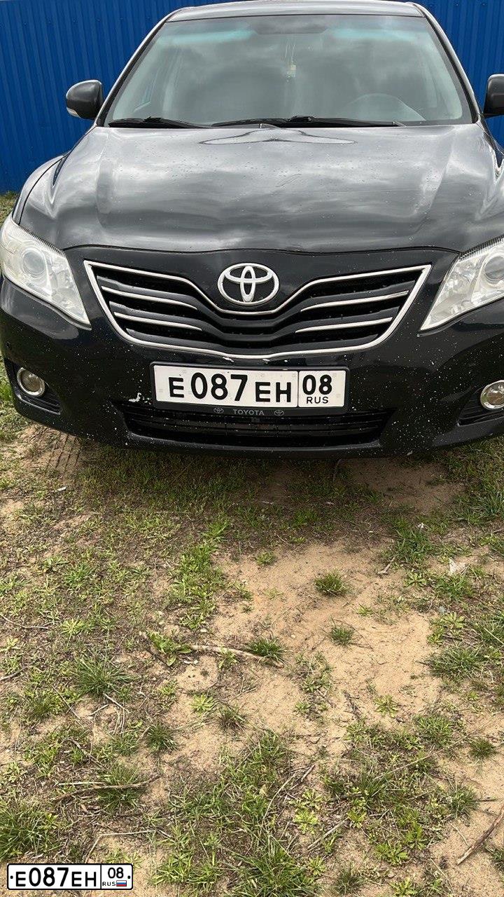 Фото автомобиля RENAULT LOGAN, 2006 — госномер Е087ЕН08. Цвет: СЕРЫЙ