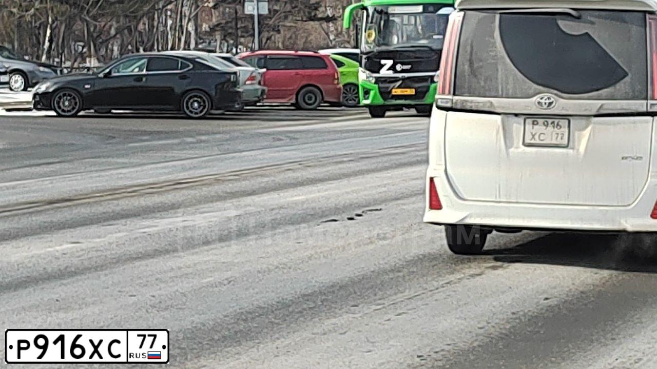 Фото автомобиля OPEL ASTRA, 2012 — госномер Р932ОВ32. Цвет: Серый