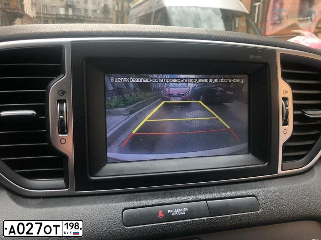 Фото автомобиля КИА QLE (SPORTAGE), 2018 — госномер Р135УТ198. Цвет: Белый