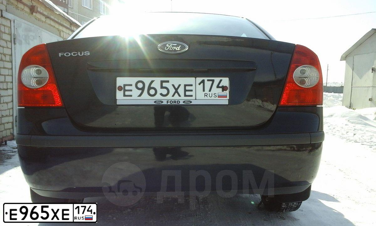 Фото автомобиля FORD FOCUS, 2006 — госномер Е965ХЕ174. Цвет: Темно-синий