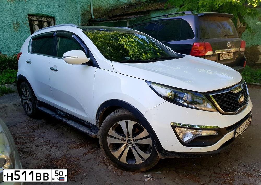 Фото автомобиля KIA SPORTAGE, 2012 — госномер В126АТ763. Цвет: ОРАНЖЕВЫЙ