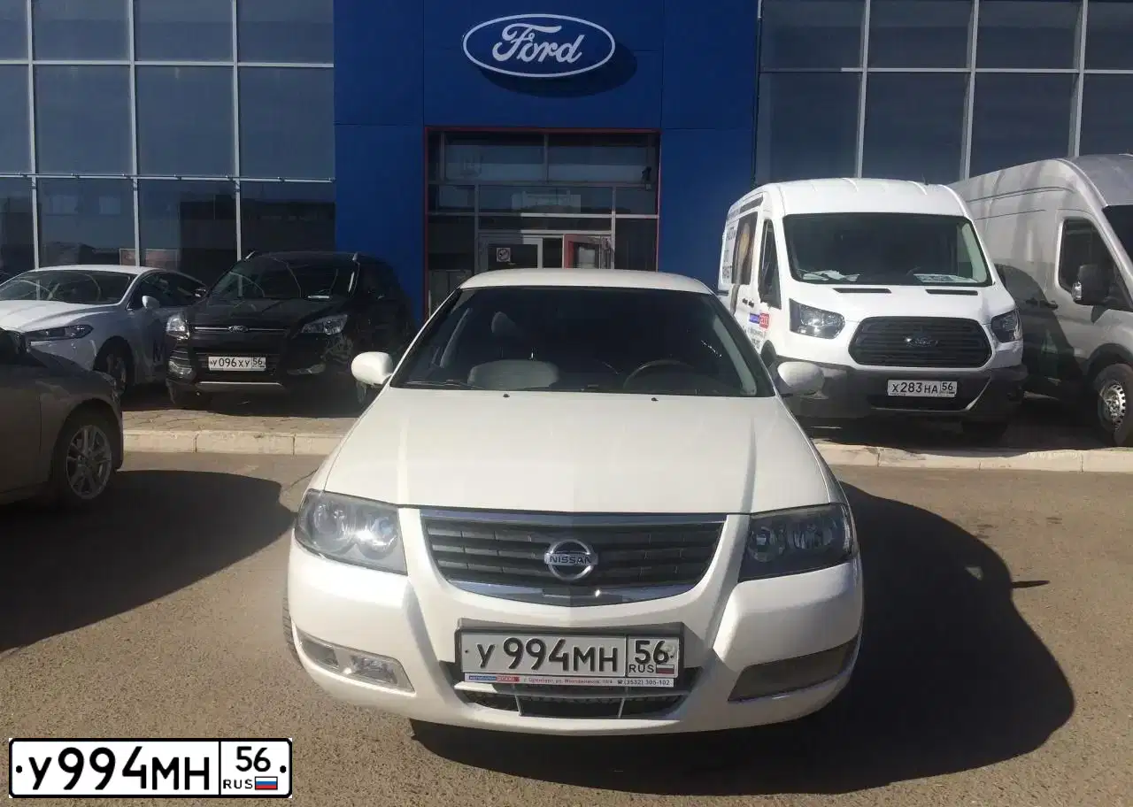Фото автомобиля NISSAN ALMERA, 2011 — госномер У994МН56. Цвет: БЕЛЫЙ
