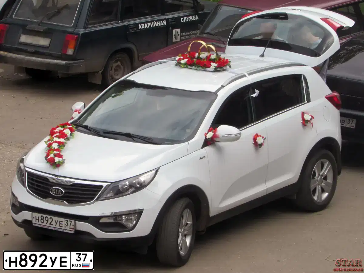 Фото автомобиля KIA SPORTAGE, 2012 — госномер А323ТУ37. Цвет: БЕЛЫЙ