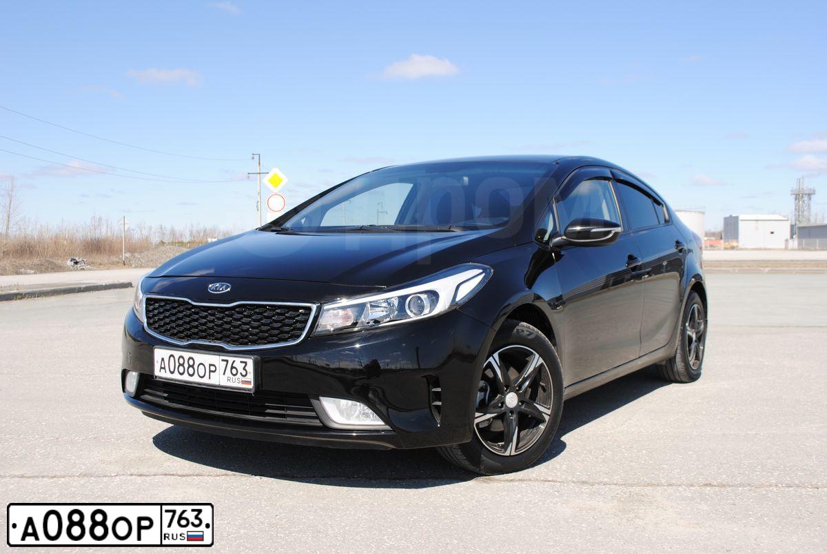 Фото автомобиля KIA CERATO, 2018 — госномер К115УЕ154. Цвет: черный