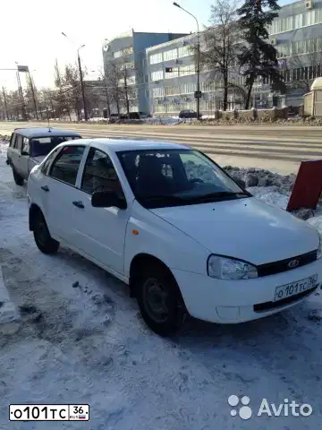 Фото автомобиля LADA 1118 KALINA, 2011 — госномер О101ТС36. Цвет: Белый