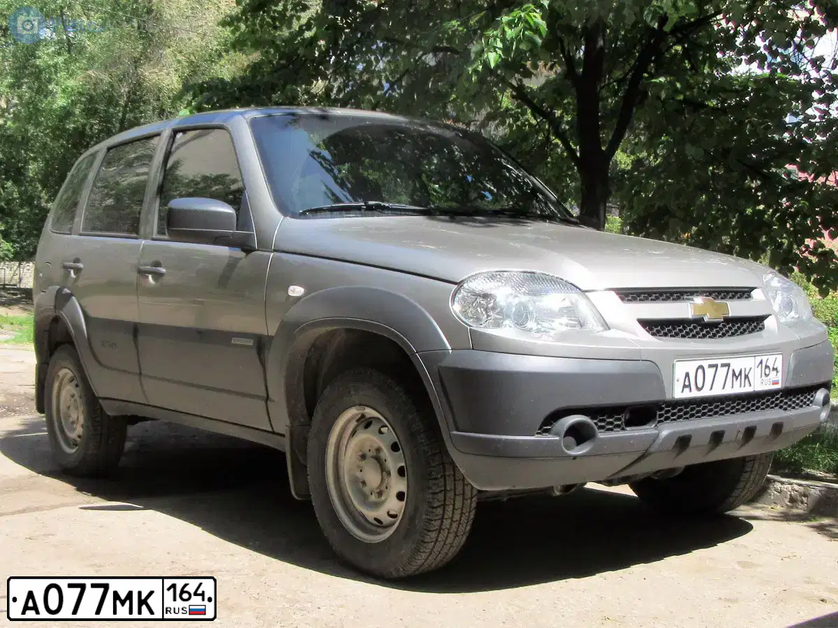 Фото автомобиля LADA 2121 NIVA, 2015 — госномер А368РЕ164. Цвет: ТЕМНО ЗЕЛЕНЫЙ